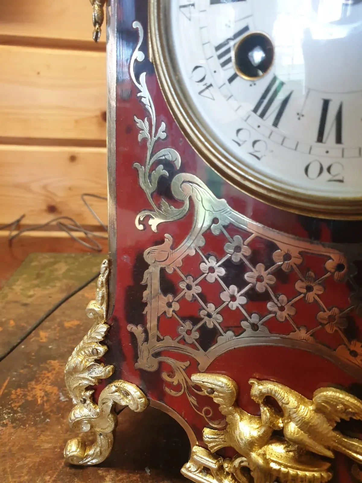 A 18th century Boulle Marquetry clock case after restoration